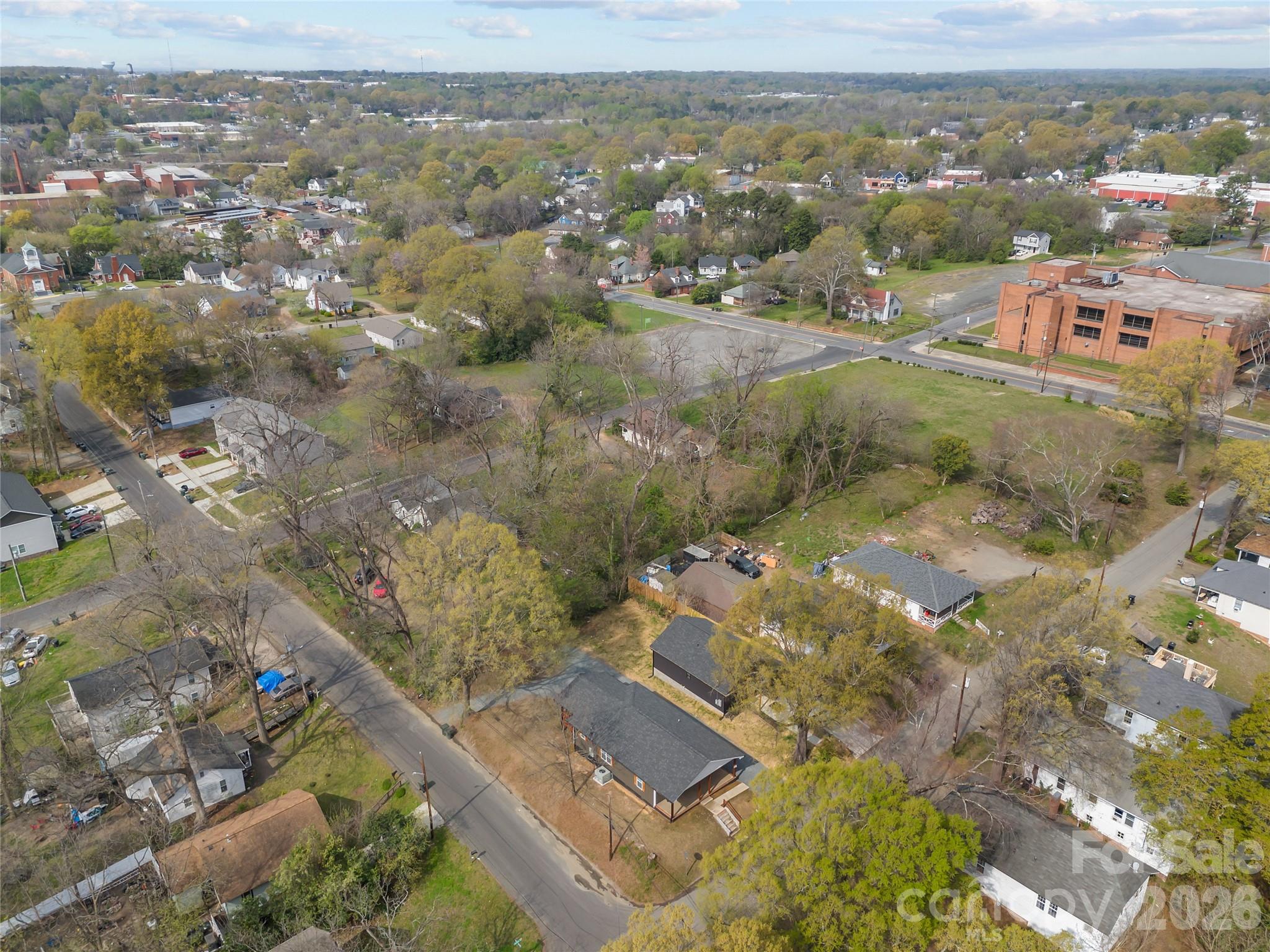 94 James Street Southwest Concord, NC 28025 - Photo 39 of 40 an aerial view of residential houses with outdoor space