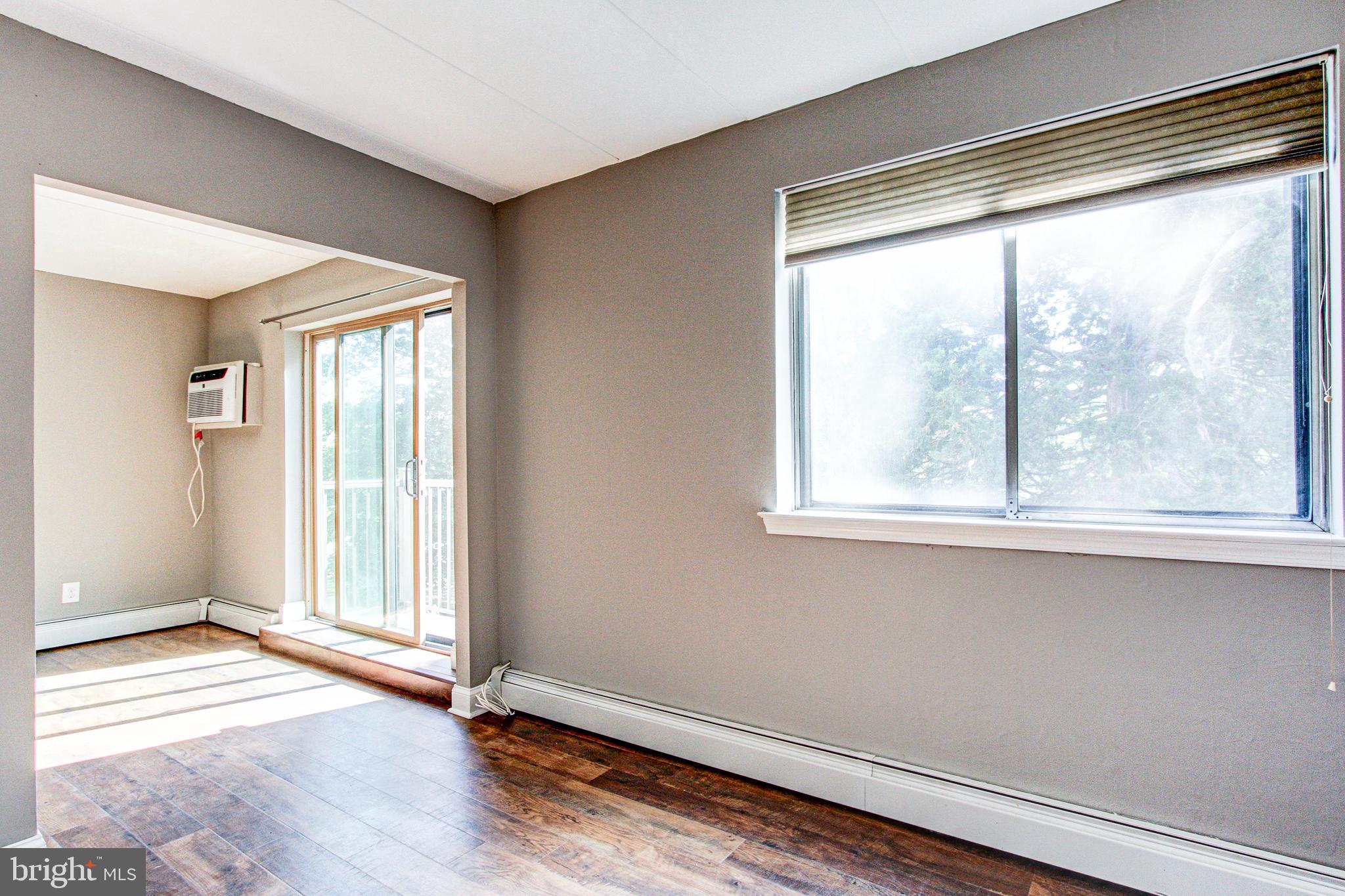 1575 West Street Road, Unit 832 Warminster, PA 18974 - Photo 5 of 18 View from dining room to family room