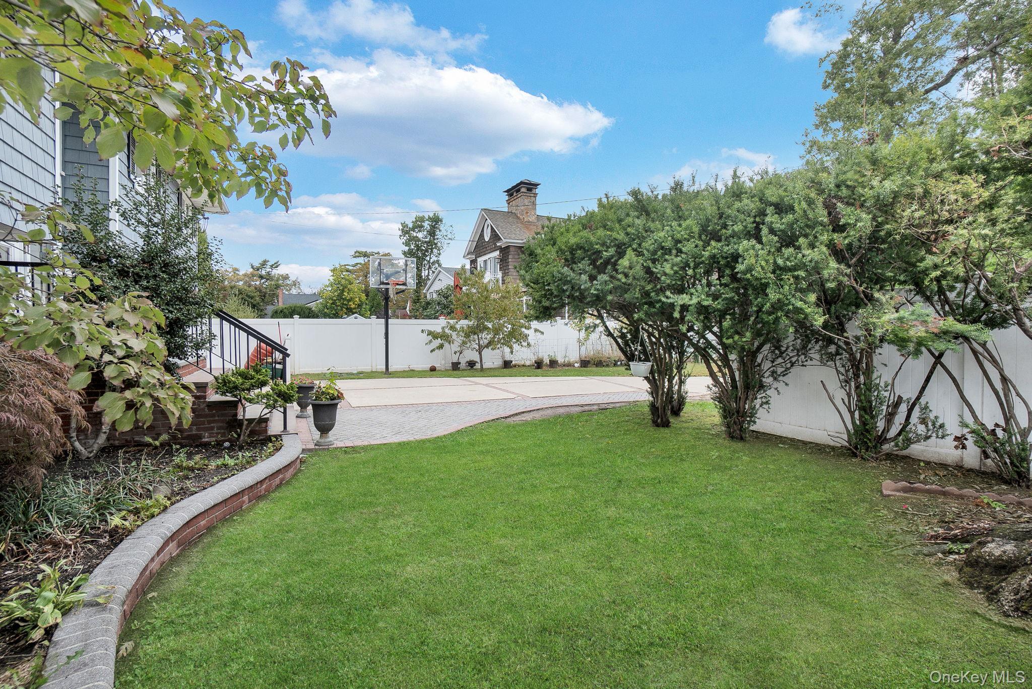 978 Little Whaleneck Road North Merrick, NY 11566 - Photo 28 of 32 View of fenced backyard