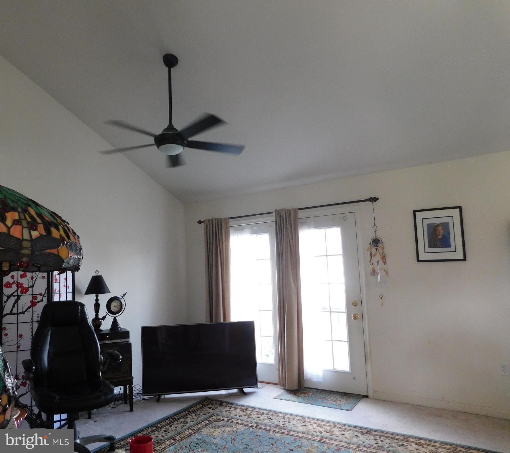 123 Beaumont Avenue Inwood, WV 25428 - Photo 8 of 14 Living room with cathedral ceilings