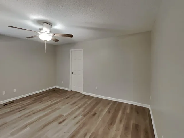 a bathroom with a double vanity sink and mirror