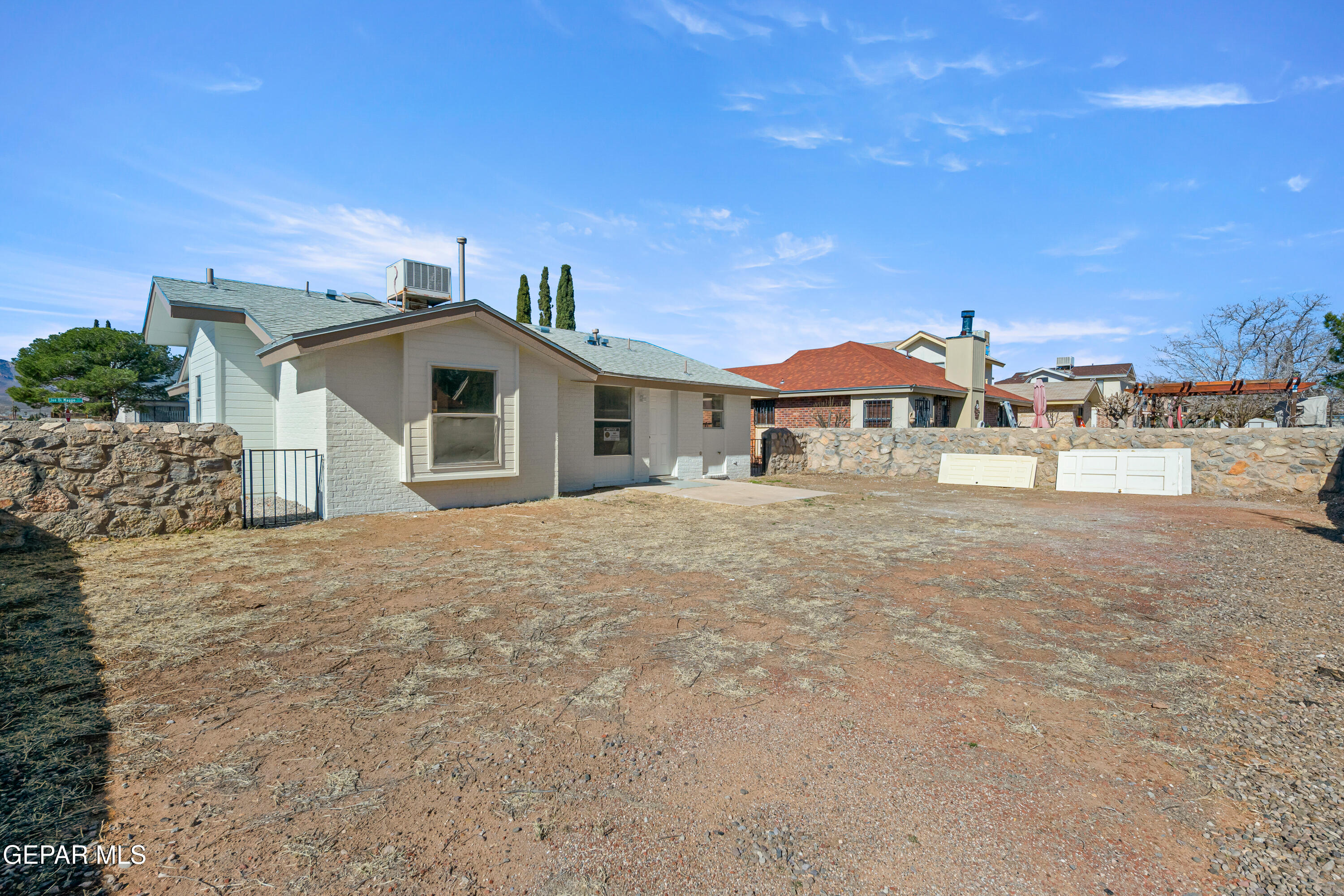 10900 Joe Dimaggio Circle El Paso, TX 79934 - Photo 22 of 22 a view of a house with a yard