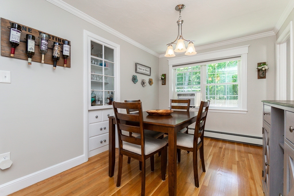 23 Thistledale Road Wakefield, MA 01880 - Photo 14 of 41 a view of a dining room with furniture window and wooden floor