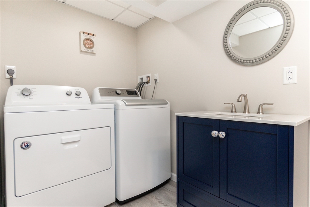 23 Thistledale Road Wakefield, MA 01880 - Photo 26 of 41 a utility room with dryer and washer