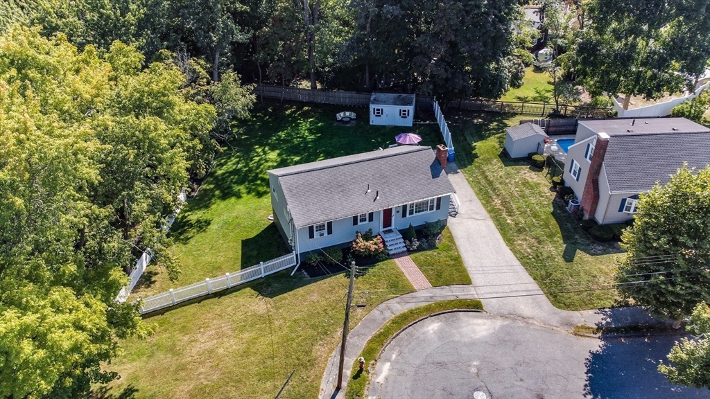 23 Thistledale Road Wakefield, MA 01880 - Photo 28 of 41 an aerial view of a house with swimming pool and large trees