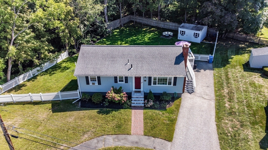 23 Thistledale Road Wakefield, MA 01880 - Photo 3 of 41 an aerial view of a house with swimming pool and a yard