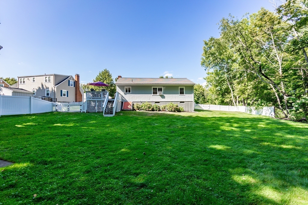 23 Thistledale Road Wakefield, MA 01880 - Photo 32 of 41 a view of a house with a back yard
