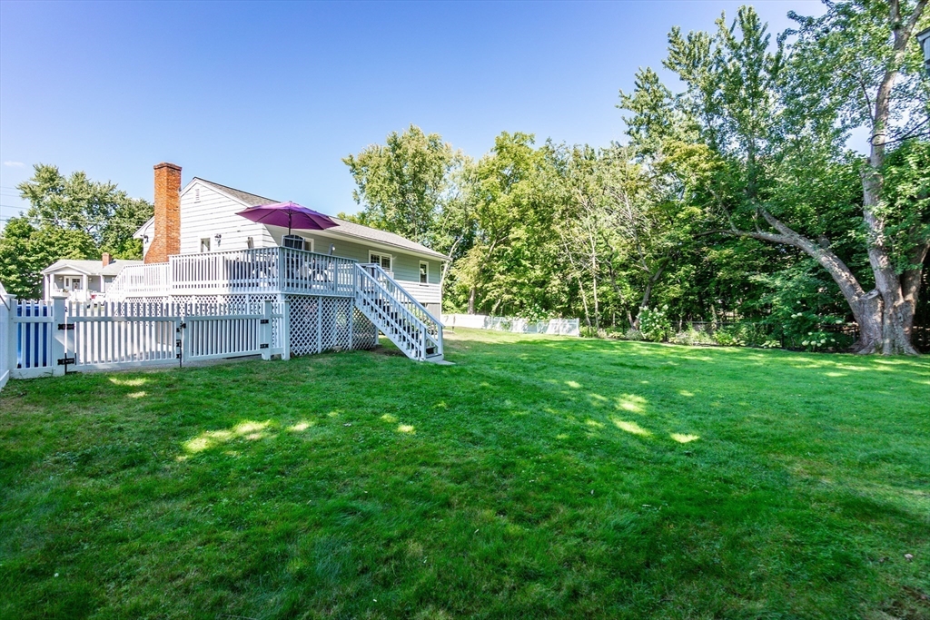 23 Thistledale Road Wakefield, MA 01880 - Photo 34 of 41 a view of a house with backyard and garden