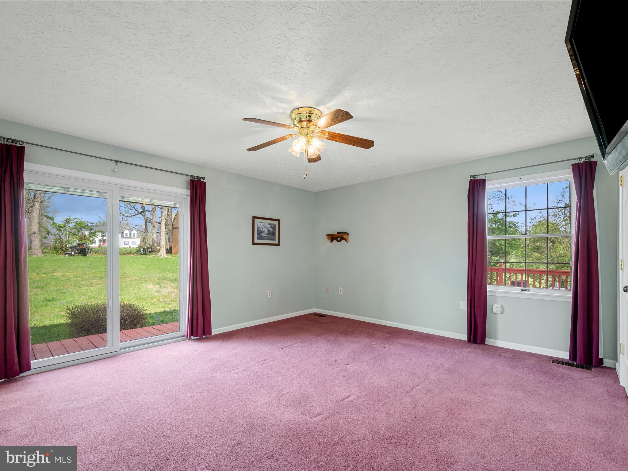 209 Sterrett Lane Winchester, VA 22603 - Photo 14 of 52 a view of an empty room with a window