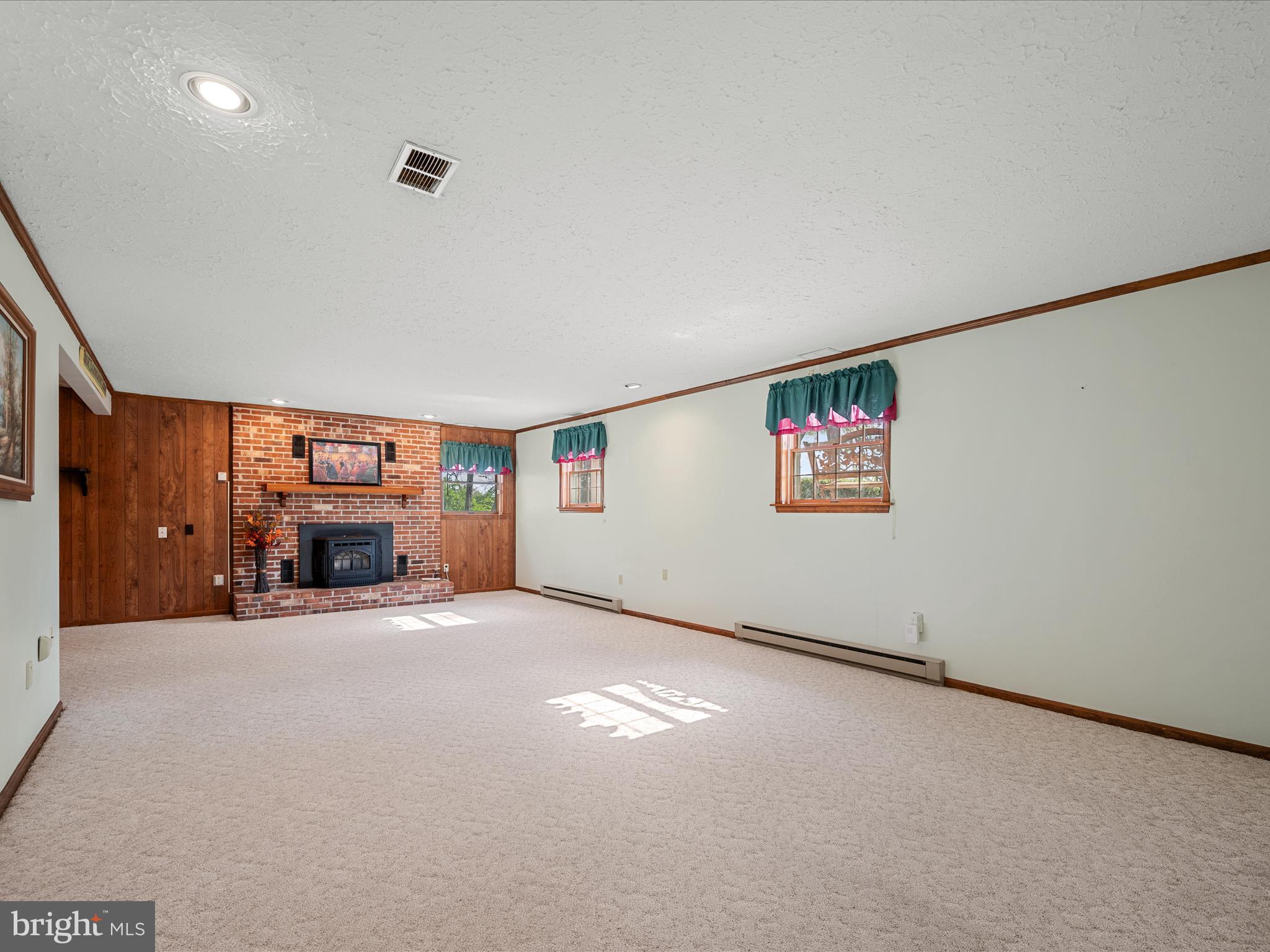 209 Sterrett Lane Winchester, VA 22603 - Photo 24 of 52 a view of a livingroom with a fireplace