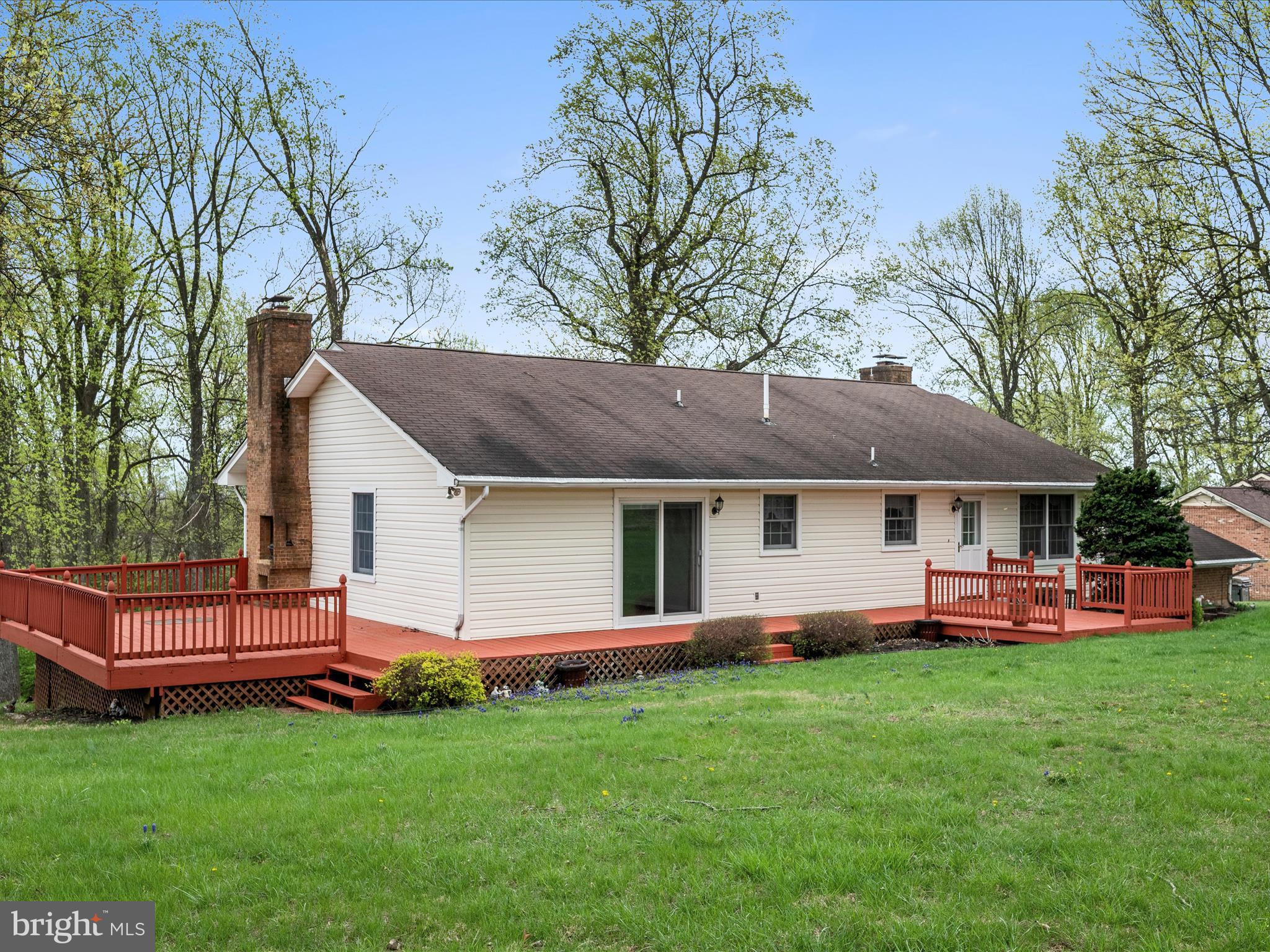 209 Sterrett Lane Winchester, VA 22603 - Photo 40 of 52 a front view of house with yard and outdoor seating