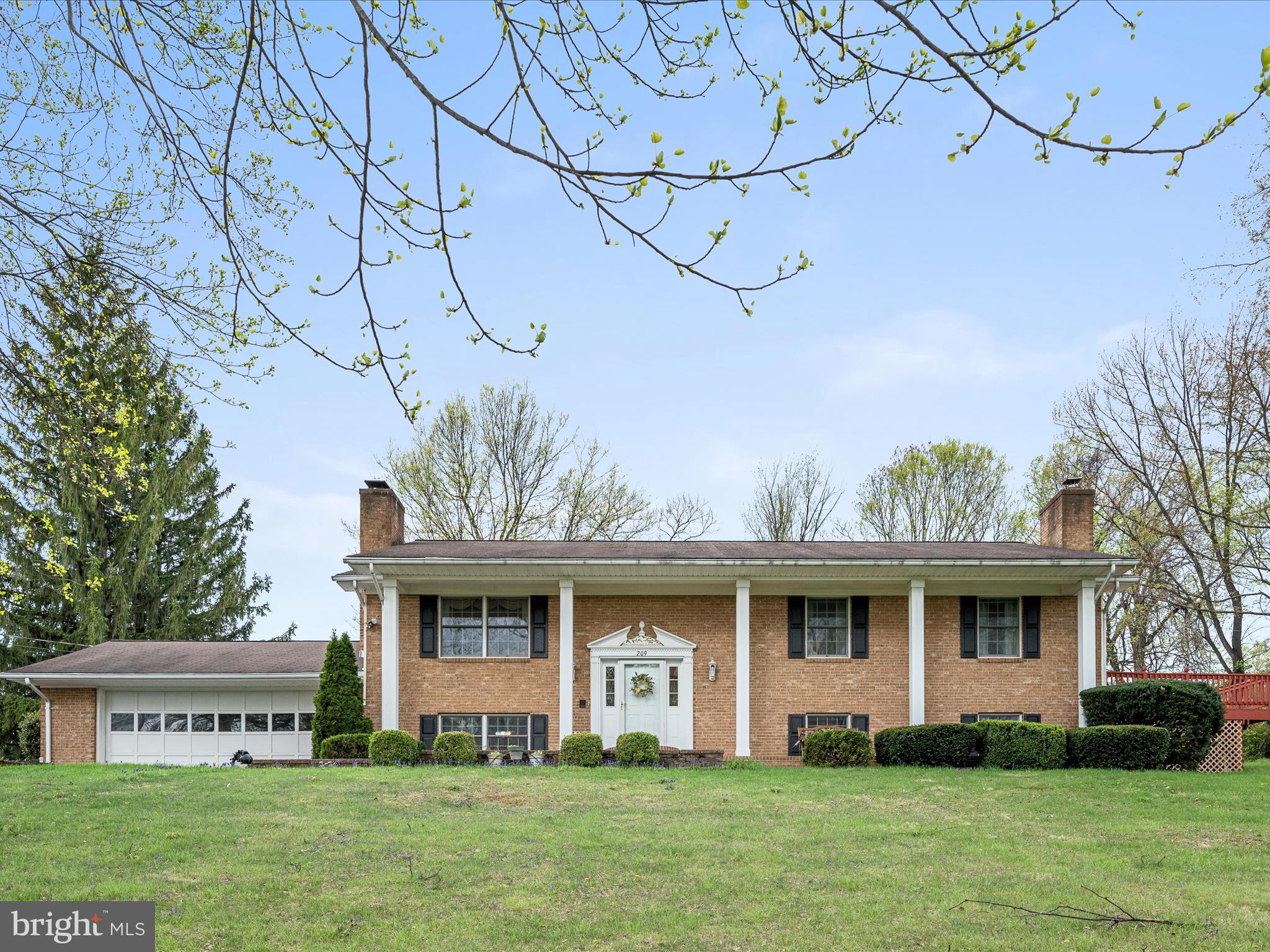 209 Sterrett Lane Winchester, VA 22603 - Photo 52 of 52 a view of a house with a yard