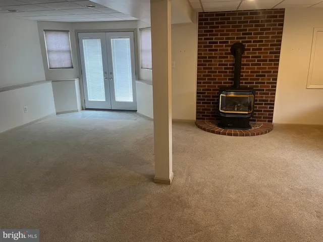 a view of empty room with windows