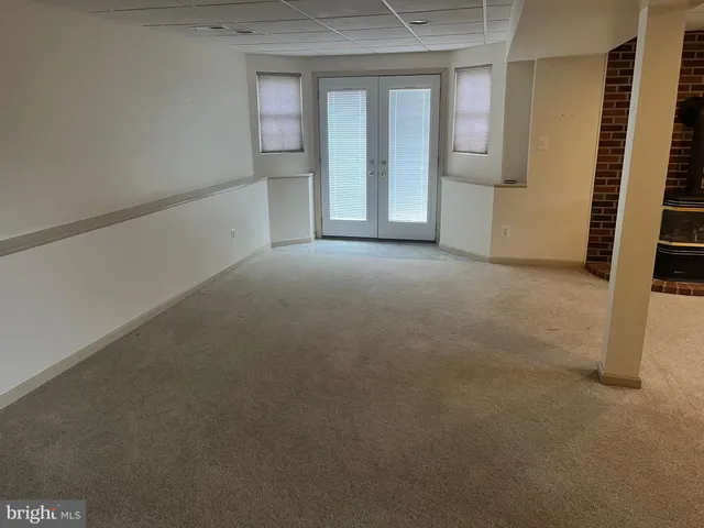 a view of a room with a window