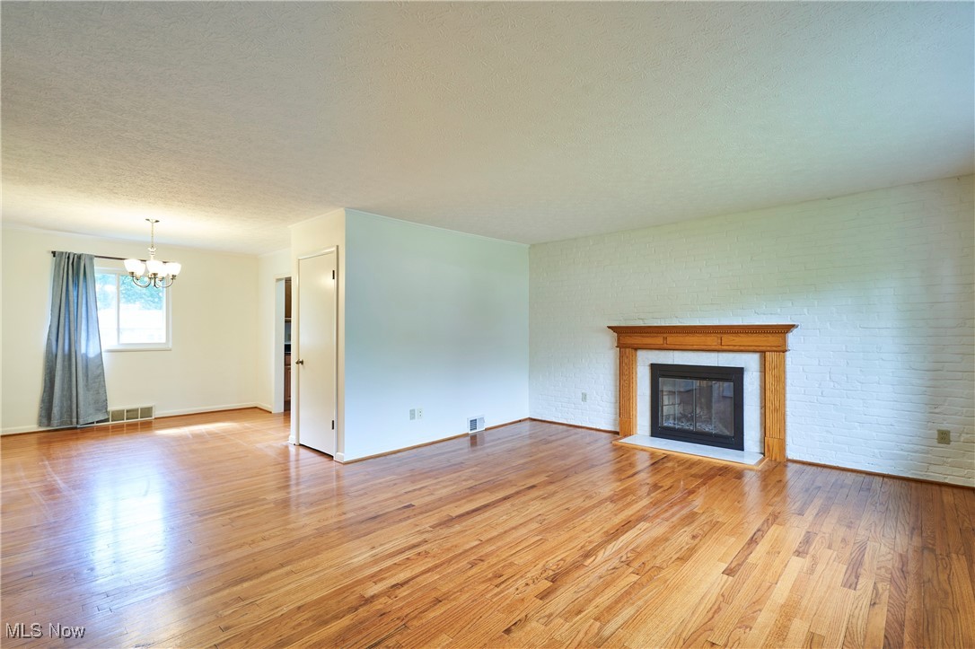 206 Benson Road Akron, OH 44333 - Photo 3 of 27 Living room and dining room view.