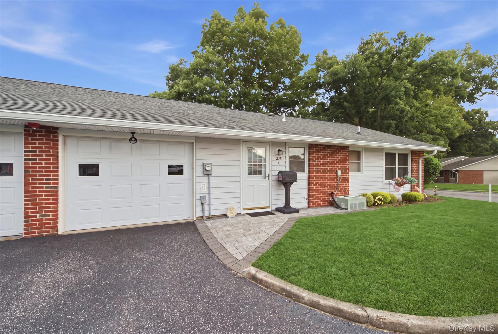 238 Blackpool Court, Unit A Ridge, NY 11961 - Photo 1 of 40 Front of Condo with attached garage