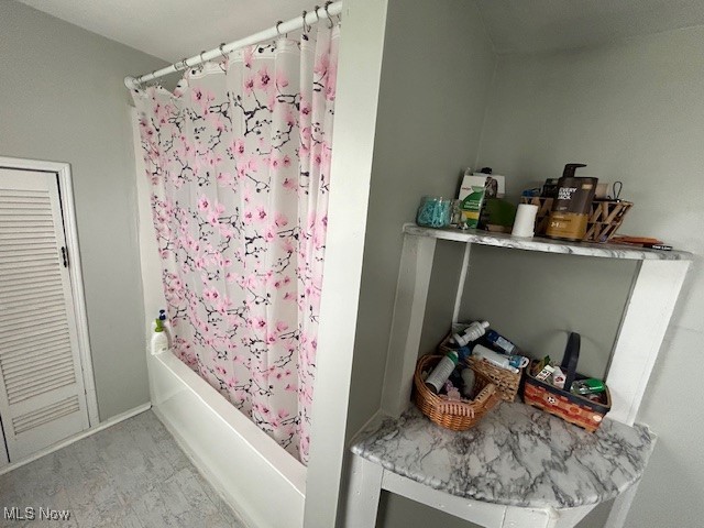 48 North Firestone Road Wooster, OH 44691 - Photo 15 of 22 Bathroom with hardwood / wood-style floors and shower / bath combination with curtain