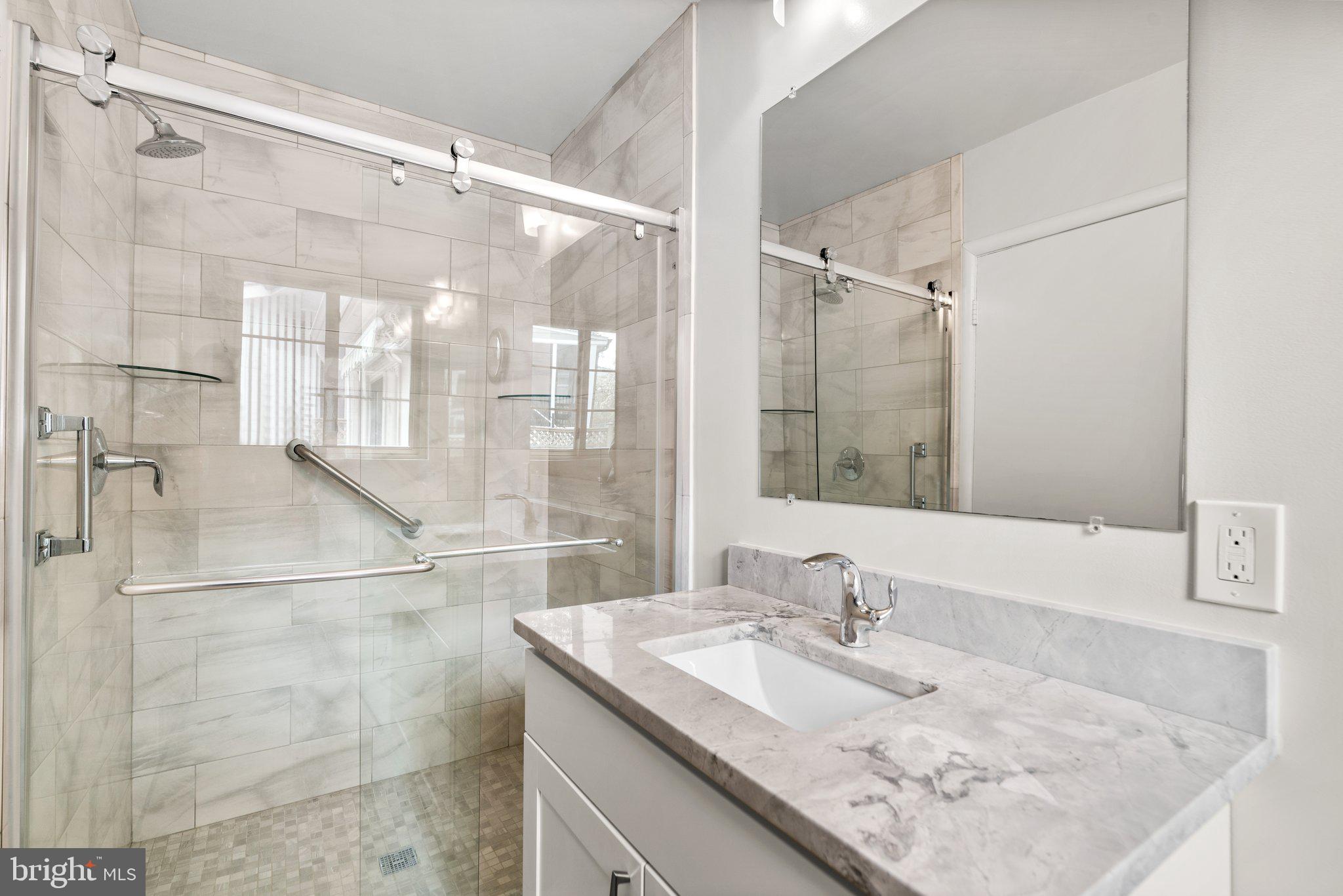 9315 Harvey Road Silver Spring, MD 20910 - Photo 24 of 44 En Suite Primary Bathroom with walk-in shower