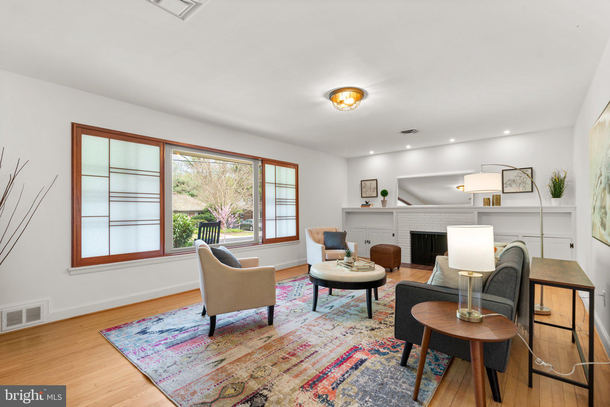 9315 Harvey Road Silver Spring, MD 20910 - Photo 8 of 44 Living Room with wood burning fireplace