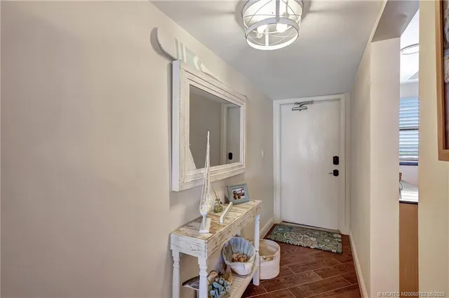 a bathroom with a sink a mirror and a window