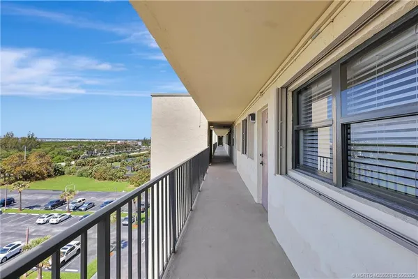 a view of a balcony with city view