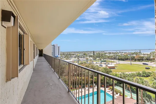 a view of a balcony with city view