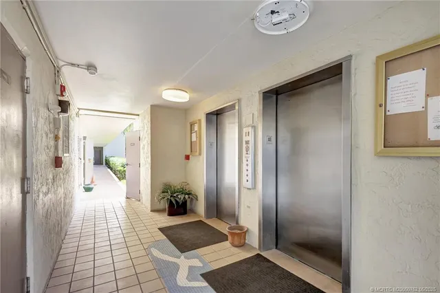 a bathroom with a glass shower door and a bathtub