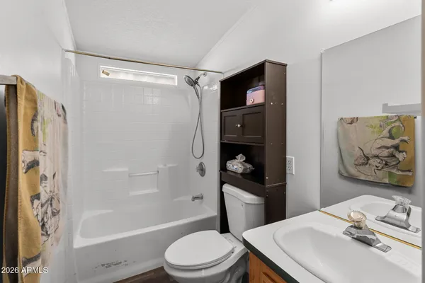 a kitchen with stainless steel appliances granite countertop a stove and a refrigerator