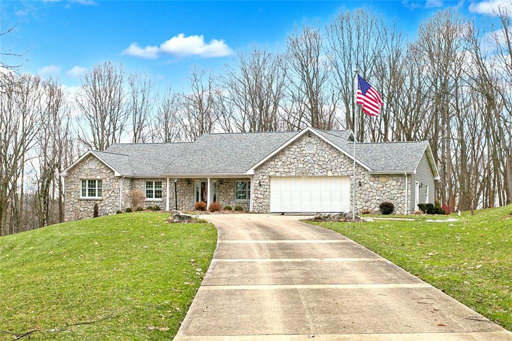7007 Craig Lane Murrysville, PA 15668 - Photo 1 of 50 a front view of a house with a yard and trees