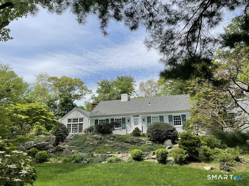 9 Tory Hole Road Darien, CT 06820 - Photo 2 of 33 a view of a house with garden and yard