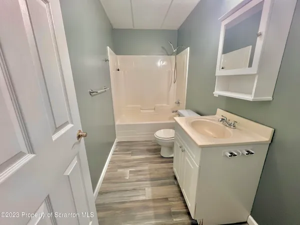 a bathroom with sink and mirror