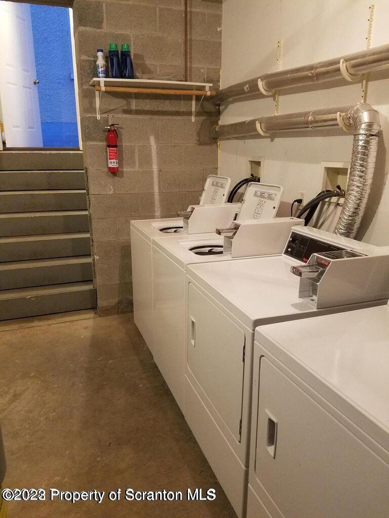 609 Mill Street, Unit 6 Dunmore, PA 18512 - Photo 10 of 10 a utility room with dryer and washer