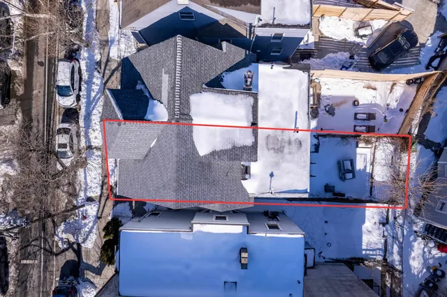 a car parked in front of a house