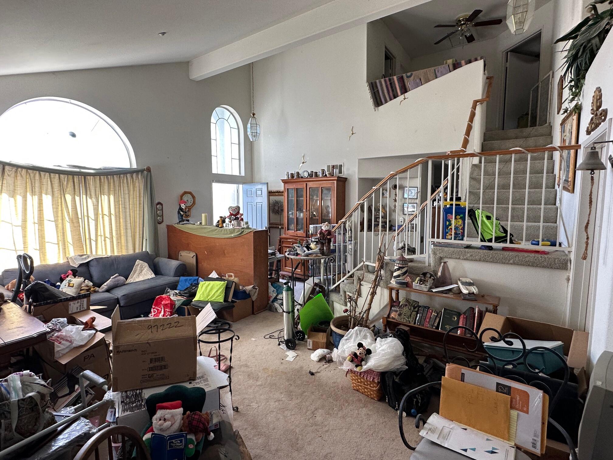 735 Blake Road Riverside, CA 92501 - Photo 3 of 24 a living room with lots of furniture and a large window