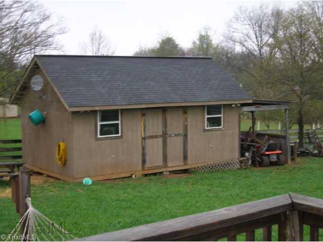 Other. 14x24 wired storage building w/lean to