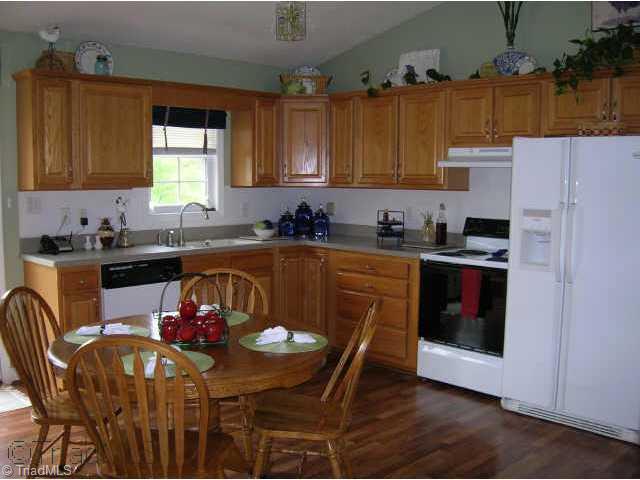 Other. Open kitchen with solid surface countertops and lots of storage space