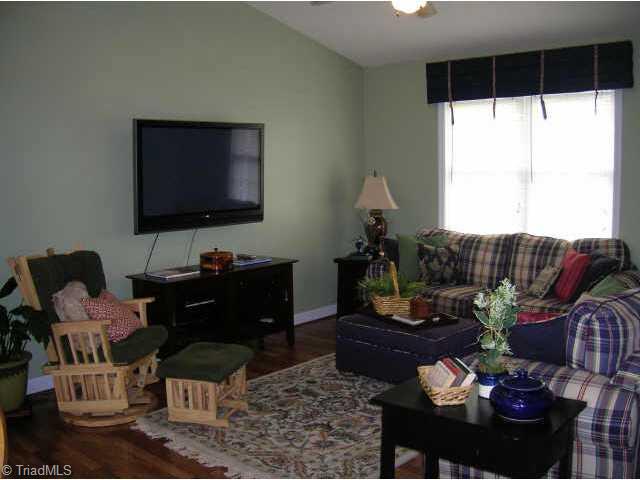 Other. Nice greatroom w/volume ceiling and laminate flooring