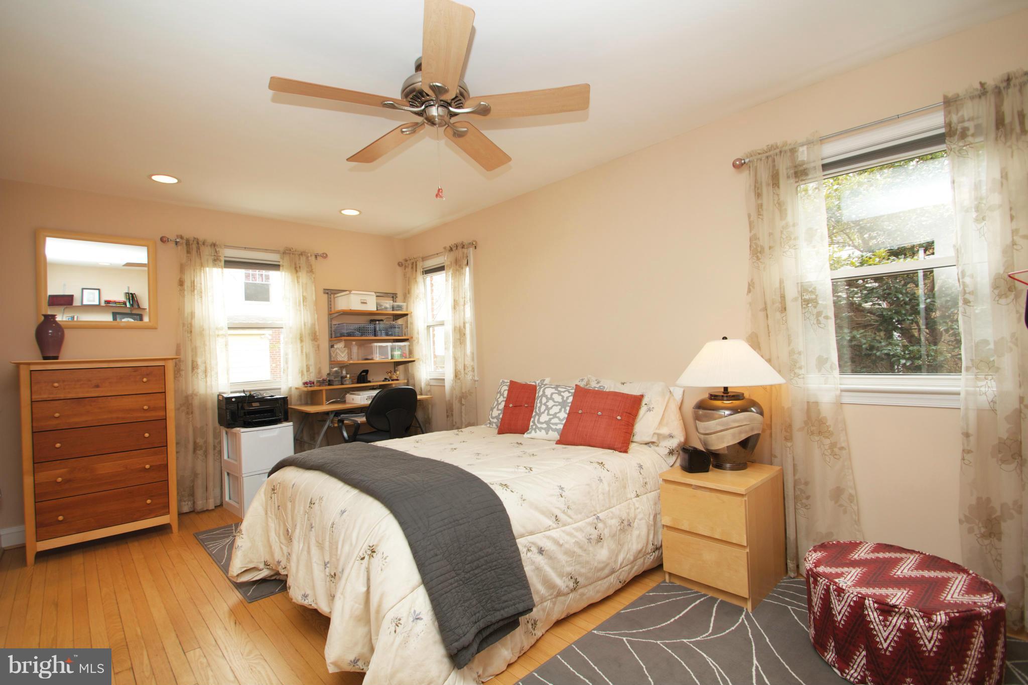8215 Maple Ridge Road Bethesda, MD 20814 - Photo 11 of 23 a bed room with a bed and a window