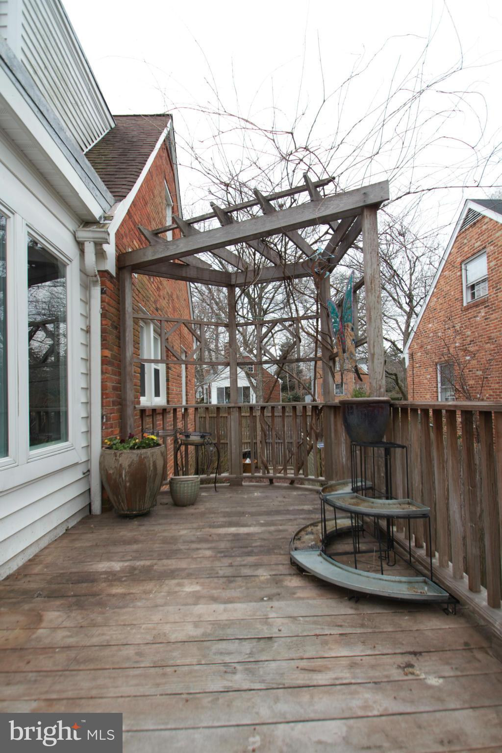 8215 Maple Ridge Road Bethesda, MD 20814 - Photo 12 of 23 a view of a house with a patio