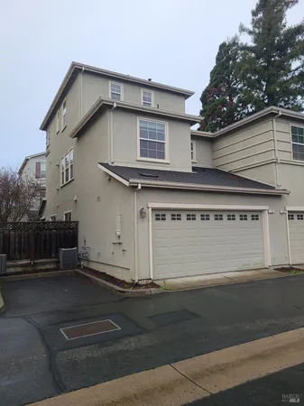 a view of a house with a garage