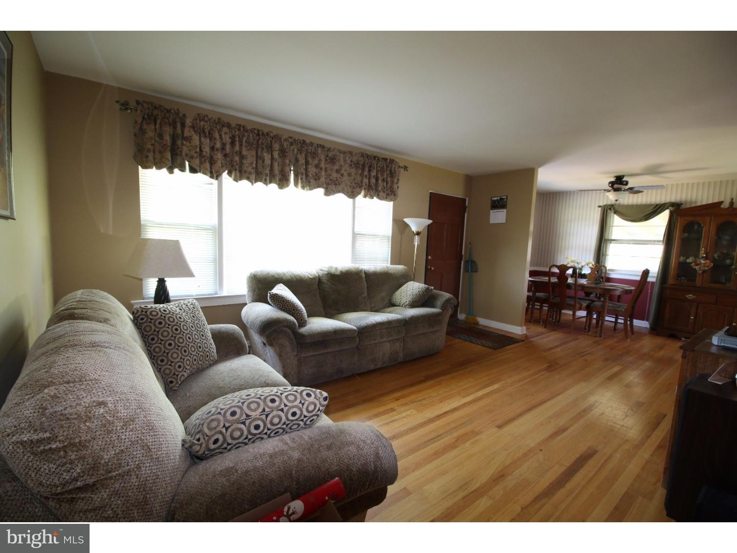 22 Nestler Road Bridgeton, NJ 08302 - Photo 11 of 14 a living room with furniture and a large window