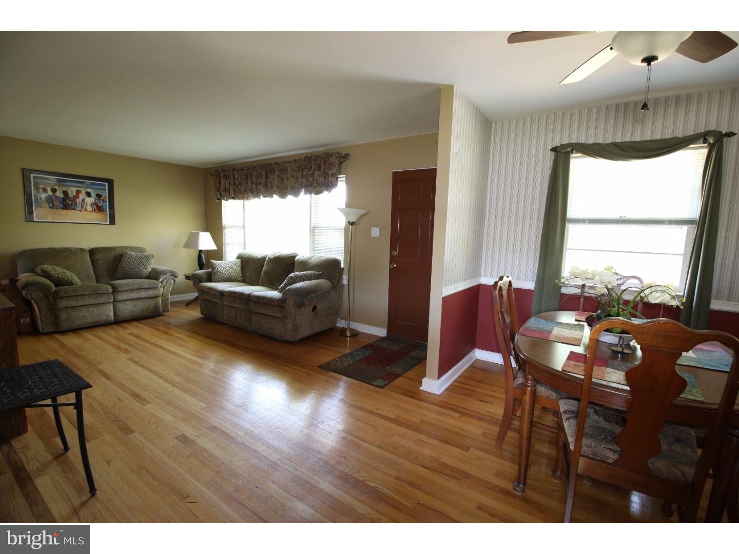 22 Nestler Road Bridgeton, NJ 08302 - Photo 12 of 14 a living room with furniture and a large window