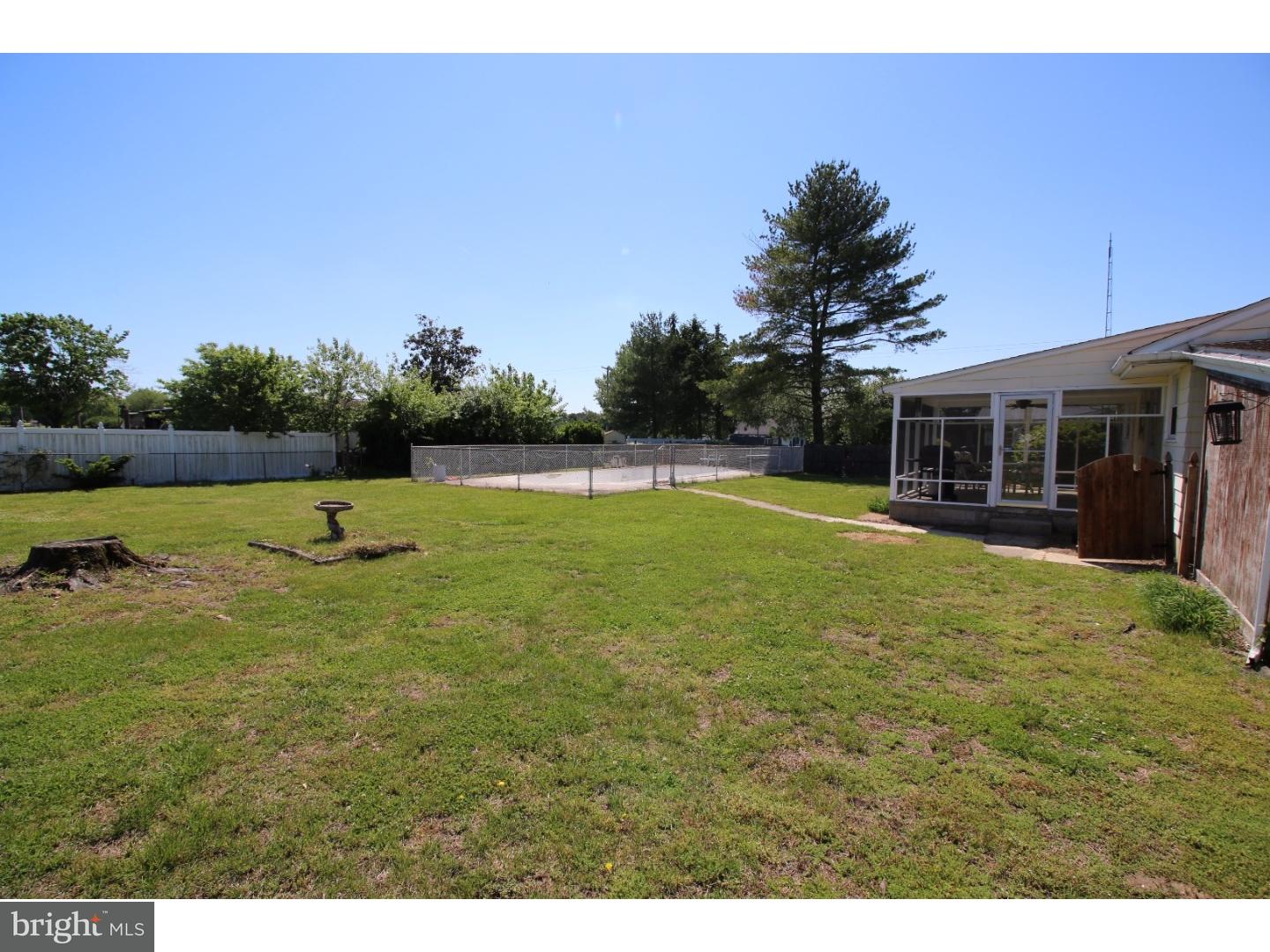 22 Nestler Road Bridgeton, NJ 08302 - Photo 14 of 14 a swimming pool with outdoor seating and yard