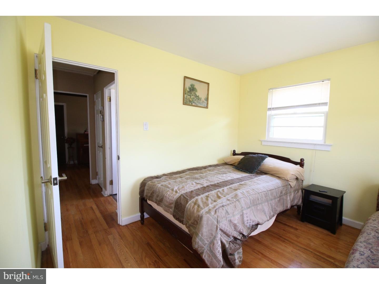 22 Nestler Road Bridgeton, NJ 08302 - Photo 9 of 14 a bedroom with a bed and a window