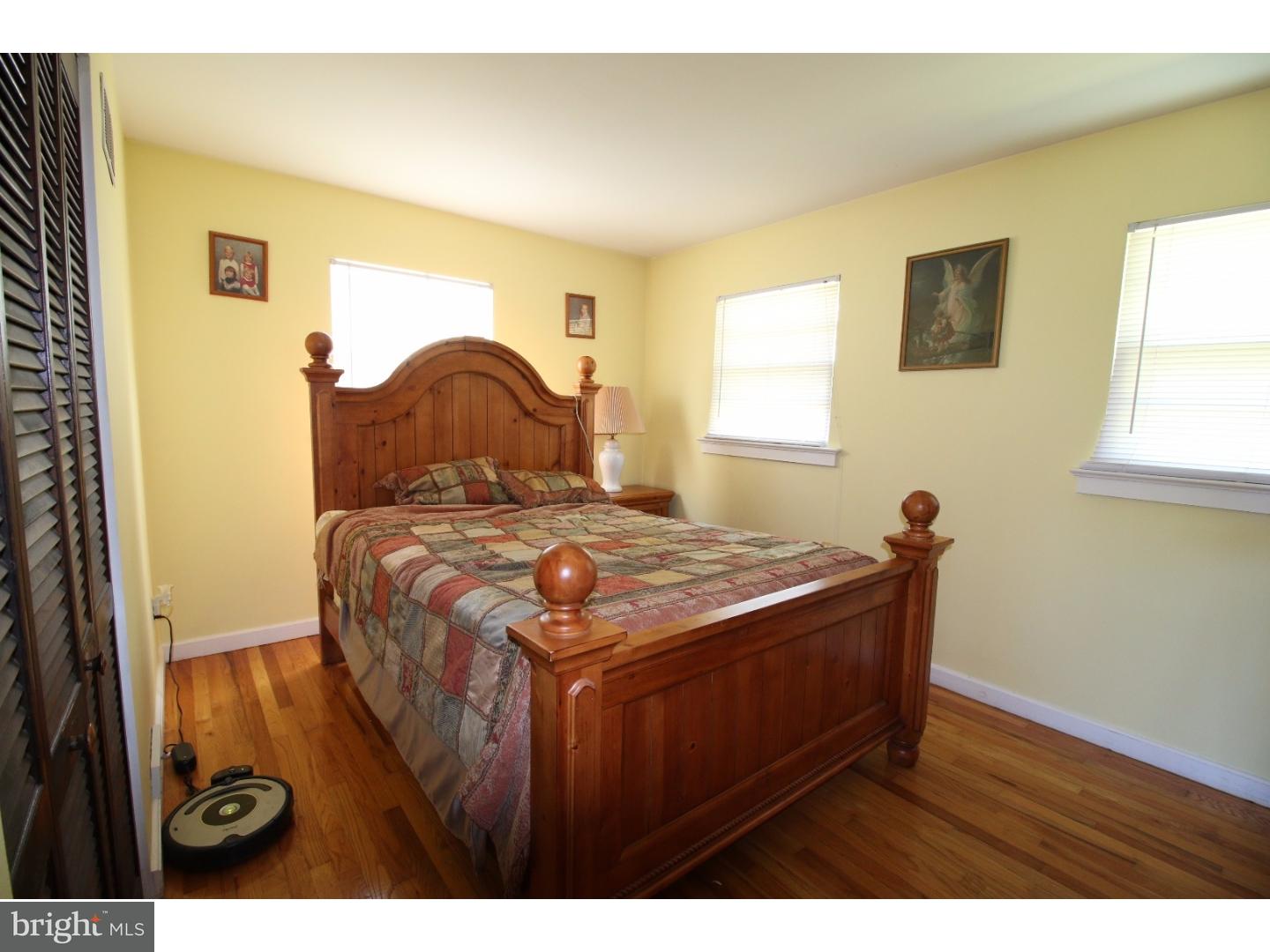 22 Nestler Road Bridgeton, NJ 08302 - Photo 10 of 14 a bed sitting in a bedroom next to a window