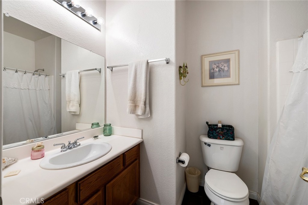 34695 Desert Road Acton, CA 93510 - Photo 23 of 68 a bathroom with a sink toilet and shower