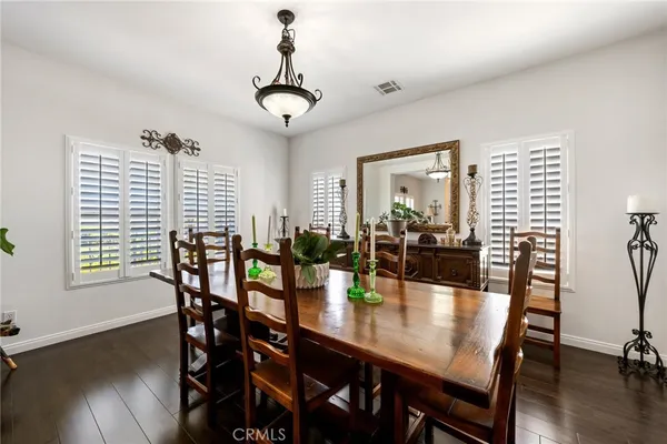 a kitchen with stainless steel appliances granite countertop sink stove top oven and cabinets