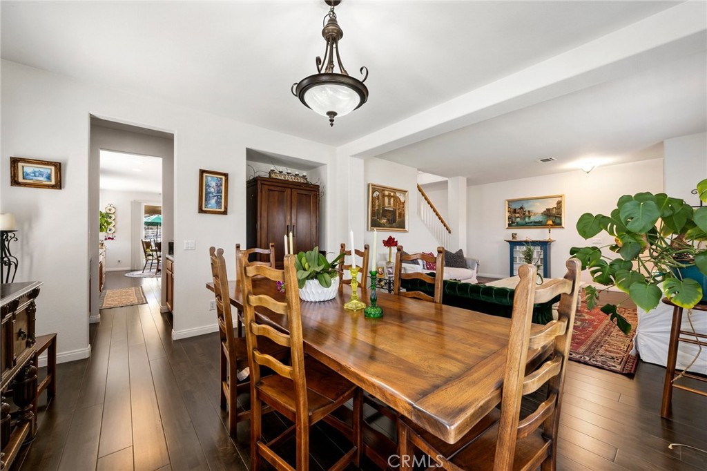 34695 Desert Road Acton, CA 93510 - Photo 30 of 68 a view of a dining room with furniture and wooden floor