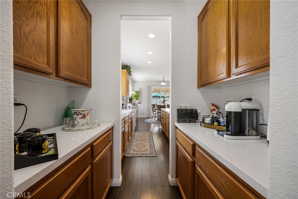 34695 Desert Road Acton, CA 93510 - Photo 39 of 68 a kitchen with stainless steel appliances granite countertop sink stove top oven and cabinets