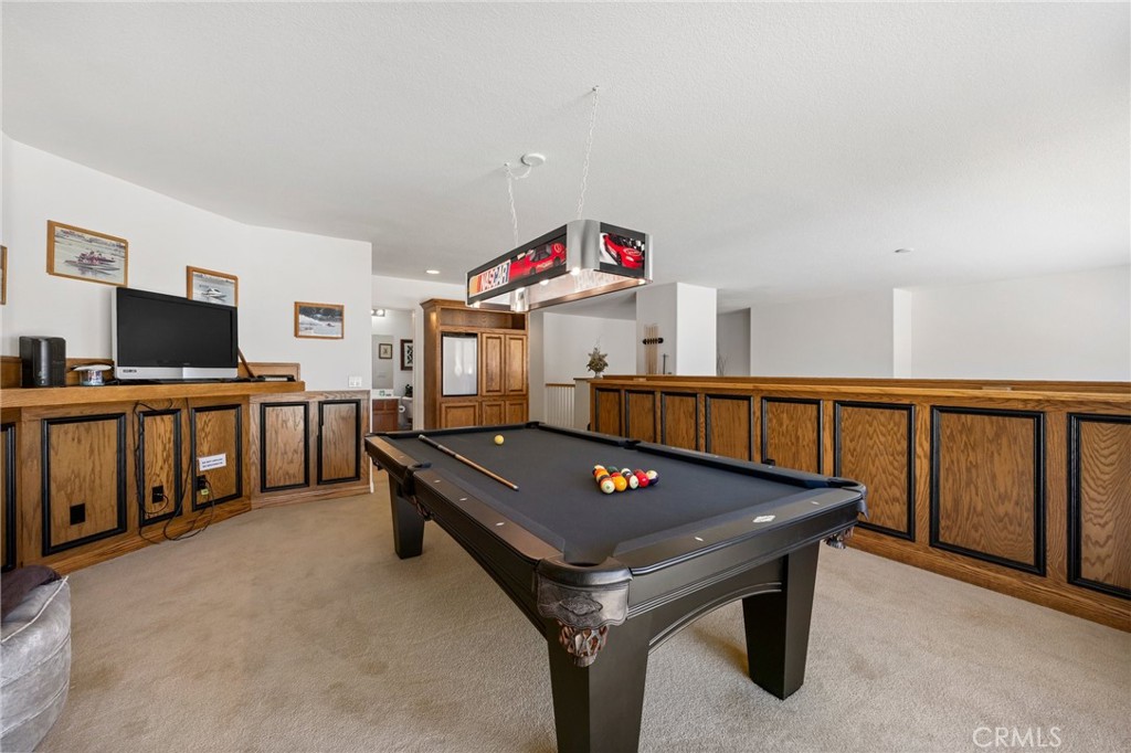 34695 Desert Road Acton, CA 93510 - Photo 41 of 68 a living room with furniture pool table and flat screen tv